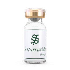 A glass vial of Retatrutide 10mg/1mL with a gold cap stands upright against a plain background.
